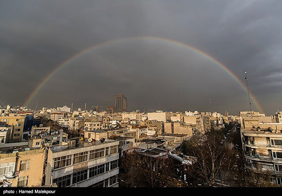 پدیده کم نظیر رنگین کمان در تهران